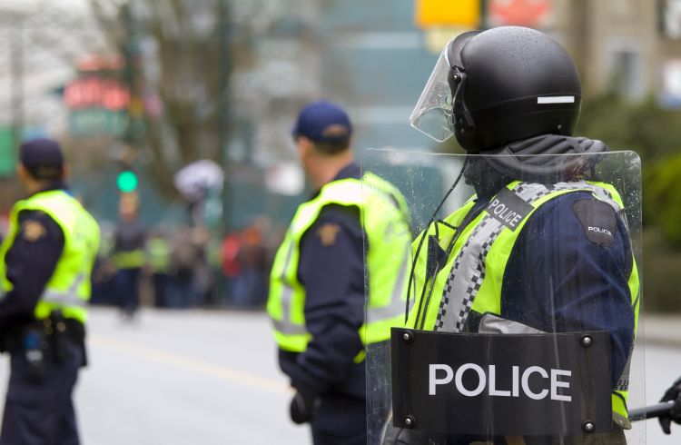 Facing protests overseas? Learn how to stay safe in a foreign country during civil unrest with these steps.