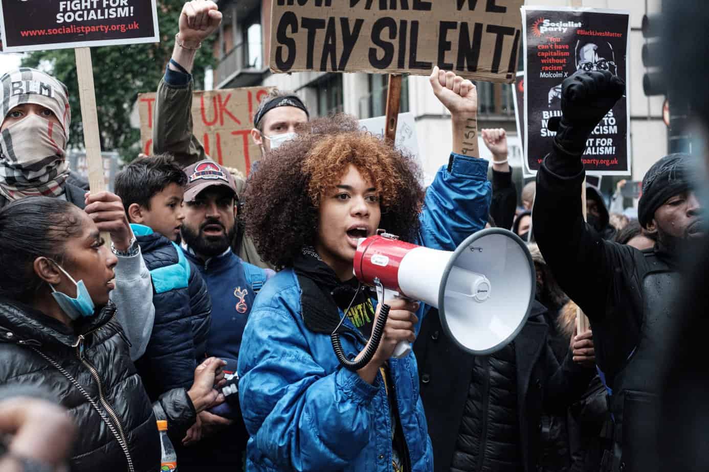 Facing protests overseas? Learn how to stay safe in a foreign country during civil unrest with these steps.