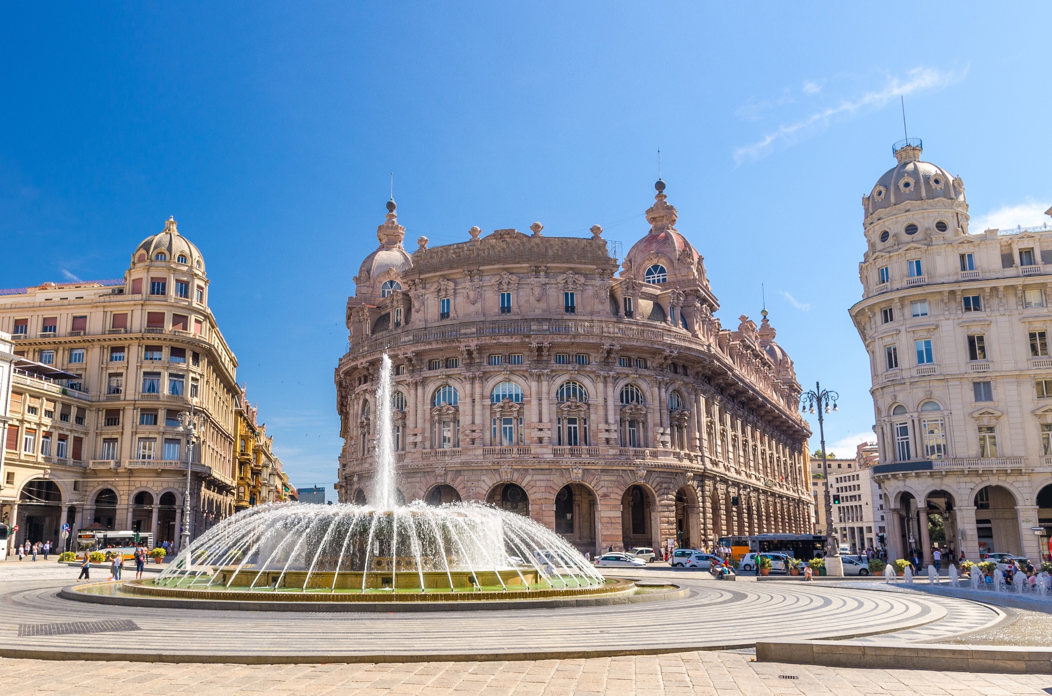What is Piazza De Ferrari famous for? (Discover the main attractions of Genoas central square)