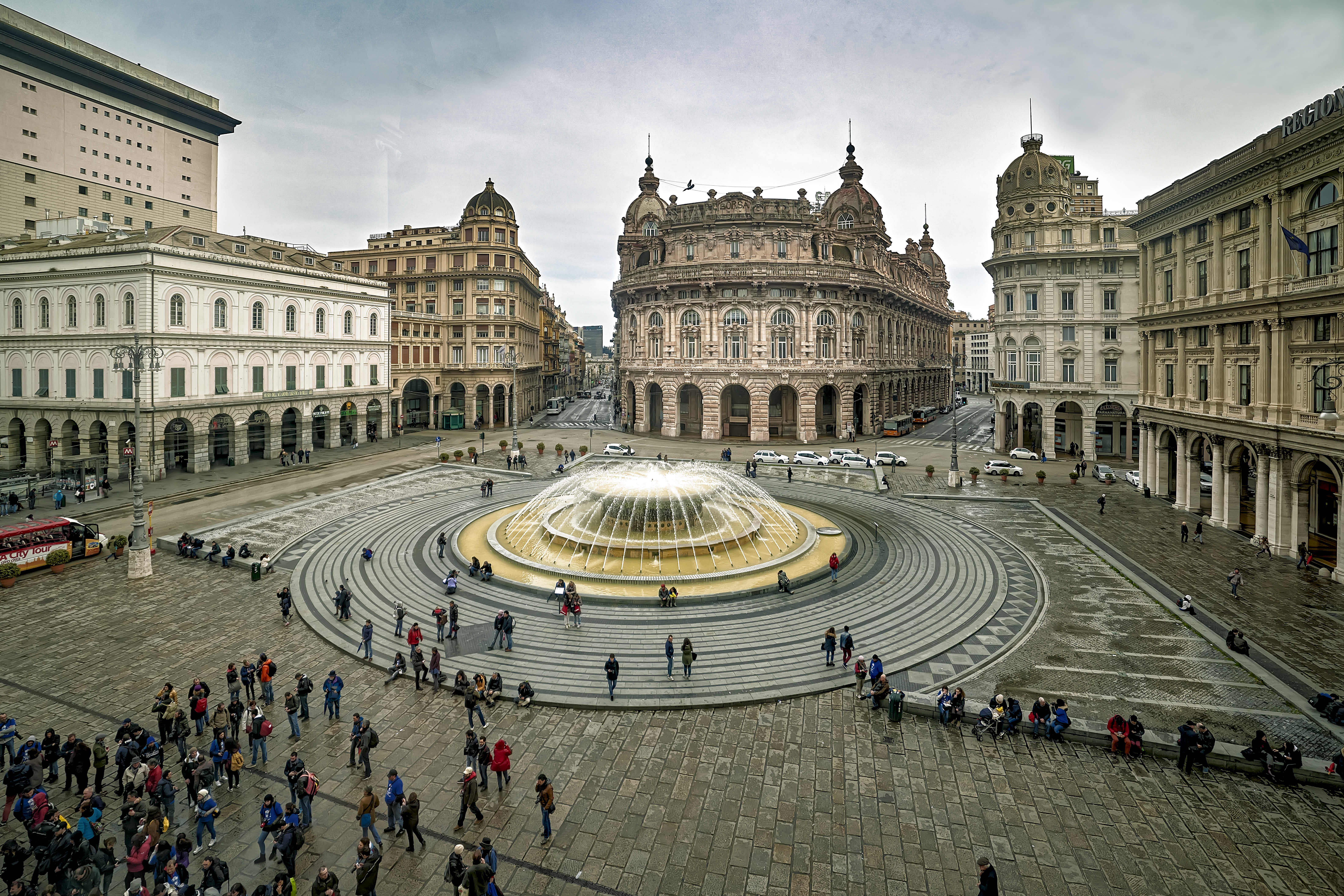 What is Piazza De Ferrari famous for? (Discover the main attractions of Genoas central square)