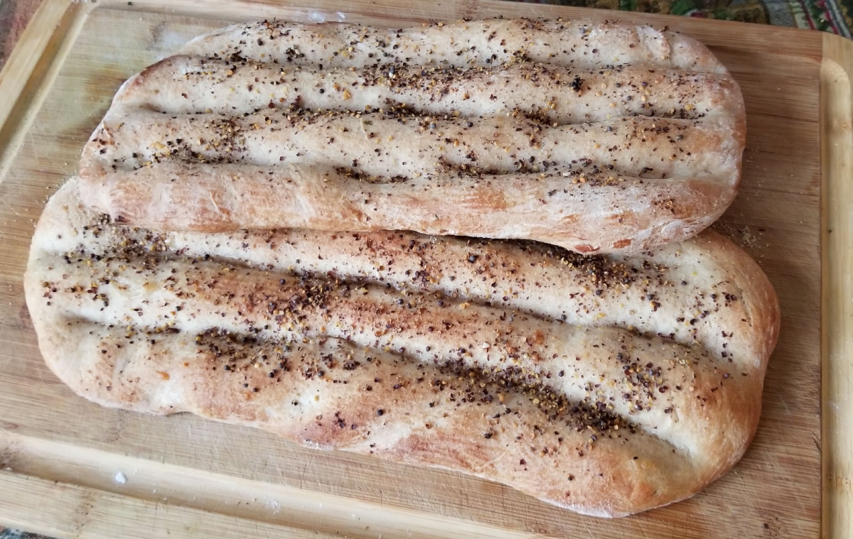 What is the county of origin nan-e barbari? Find out precisely where this delicious bread started.